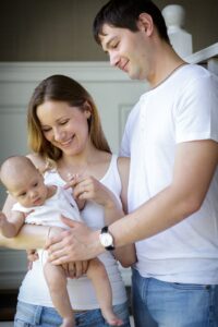 happy young family with baby child
