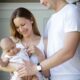 happy young family with baby child